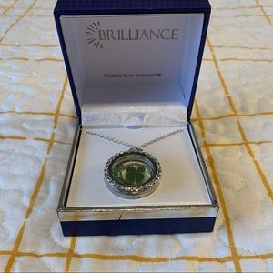 Brilliance Locket necklace with Four leaf clear glass gem inside